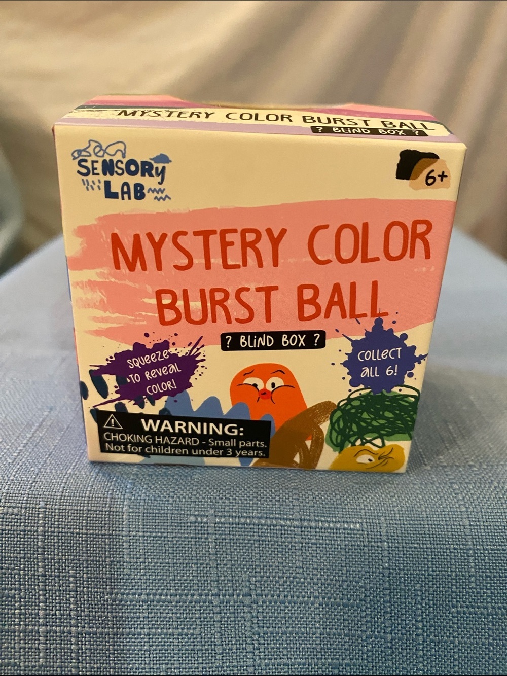 Sensory Lab Mystery Color Burst Ball - Squeeze until center burst